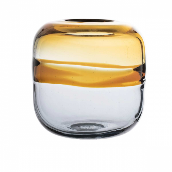 Lexcia è un vaso in vetro unico. Infatti ogni vaso è realizzato a mano quindi non esiste un pezzo uguale all'altro. Il vaso decorativo ha una forma cilindrica in doppio colore; la parte superiore gialla e la parte inferiore di vetro trasparente. Fa parte della linea Nordic di Bloomingville